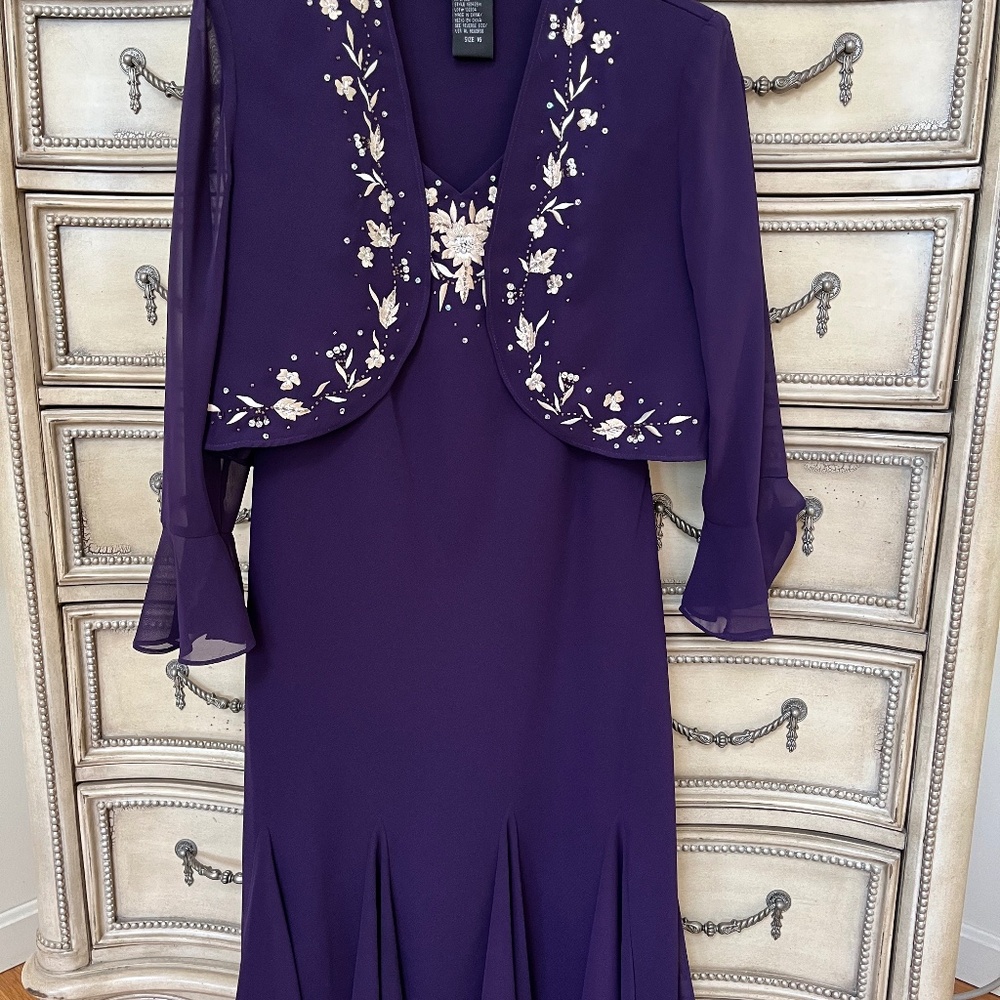 Formal pearl and sequin sleeveless dress with jacket.